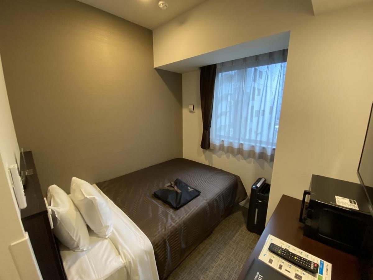 Hotel Livemax Premium Nagoya Marunouchi Bagian luar foto