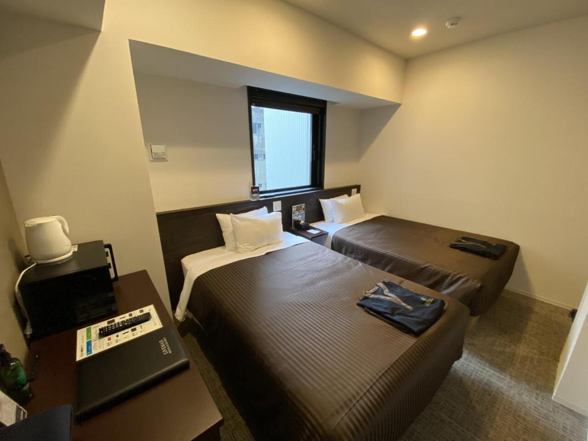 Hotel Livemax Premium Nagoya Marunouchi Bagian luar foto